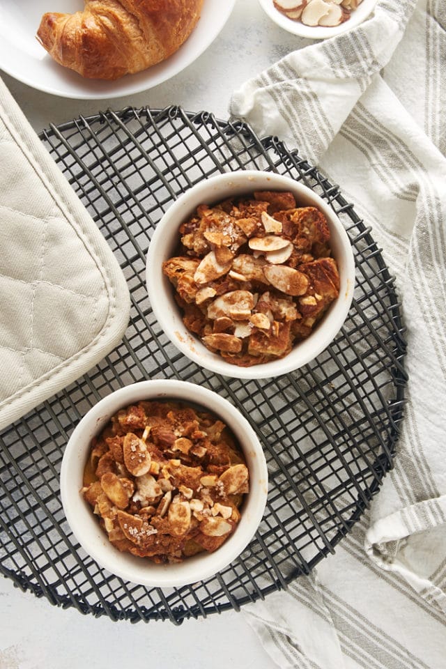 overhead view of freshly baked Cinnamon Almond Bread Pudding for Two on a wire rack