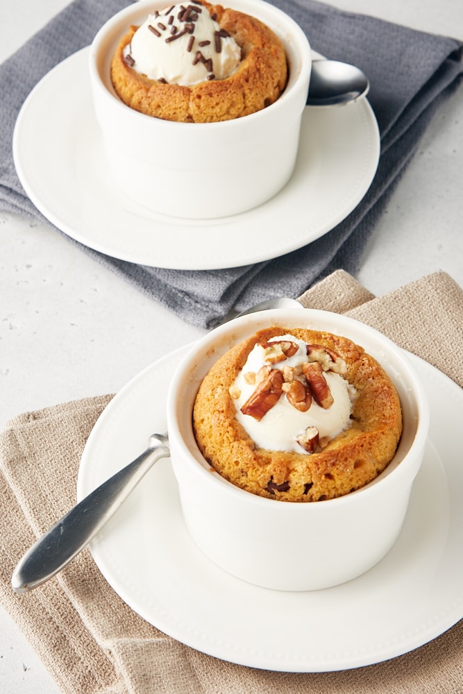 Deep Dish Chocolate Chip Cookies for Two served on white plates on top of beige and gray napkins