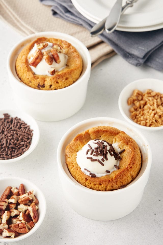 Deep Dish Chocolate Chip Cookies for Two topped with ice cream, nuts, and sprinkles