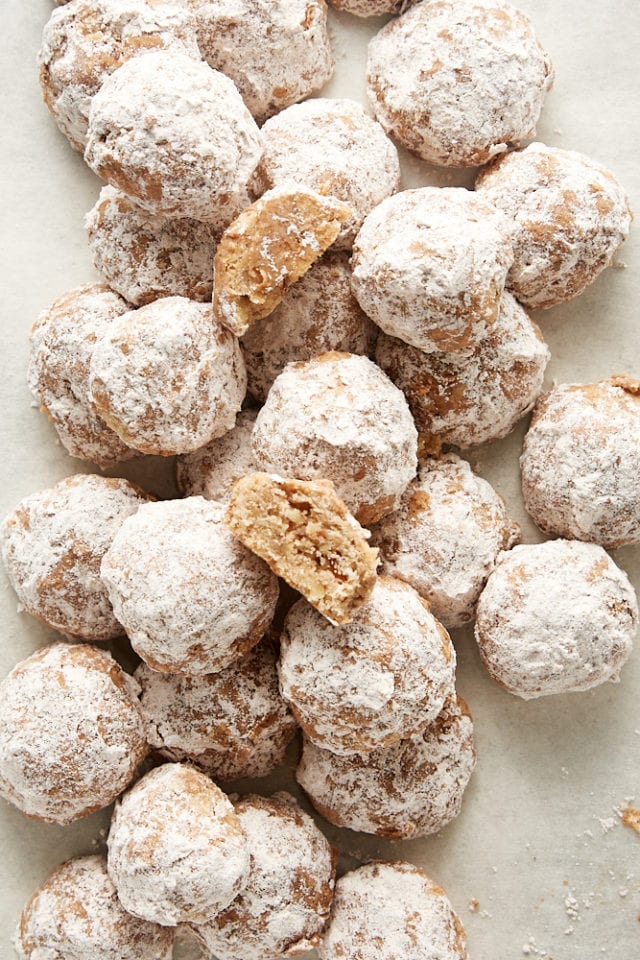 overhead view of Nutty Spiced Snowball Cookies in a pile
