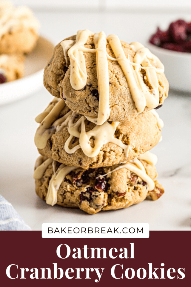 Oatmeal Cranberry Cookies with white chocolate drizzled on top.
