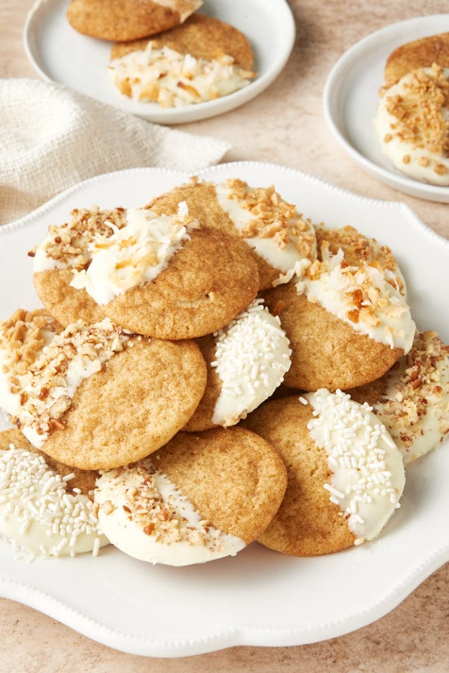 White Chocolate Snickerdoodles piled on a white plate