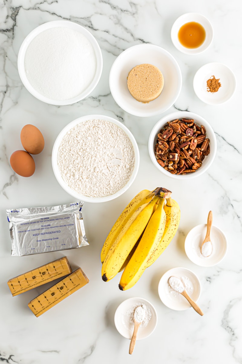 Overhead view of cream cheese banana nut bread ingredients