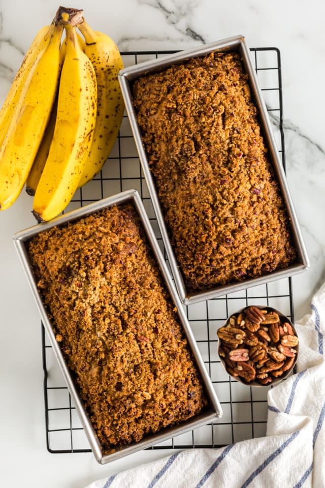 Overhead view of two pans of cream cheese banana nut bread