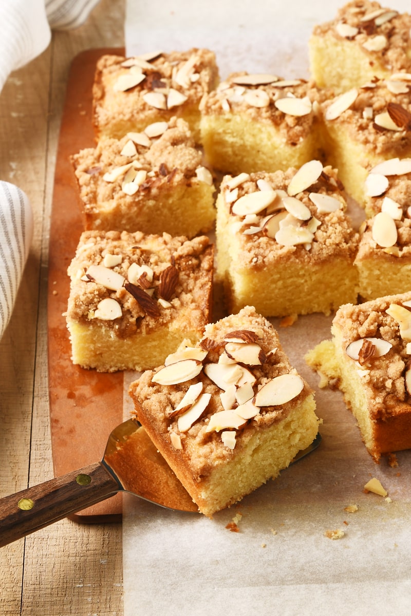 slices of Almond Crumb Cake on a wooden cutting board