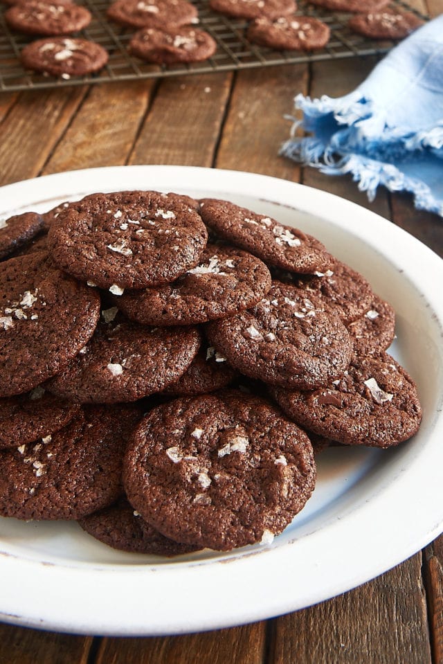 pile of Salted Double Chocolate Cookies on a white plate