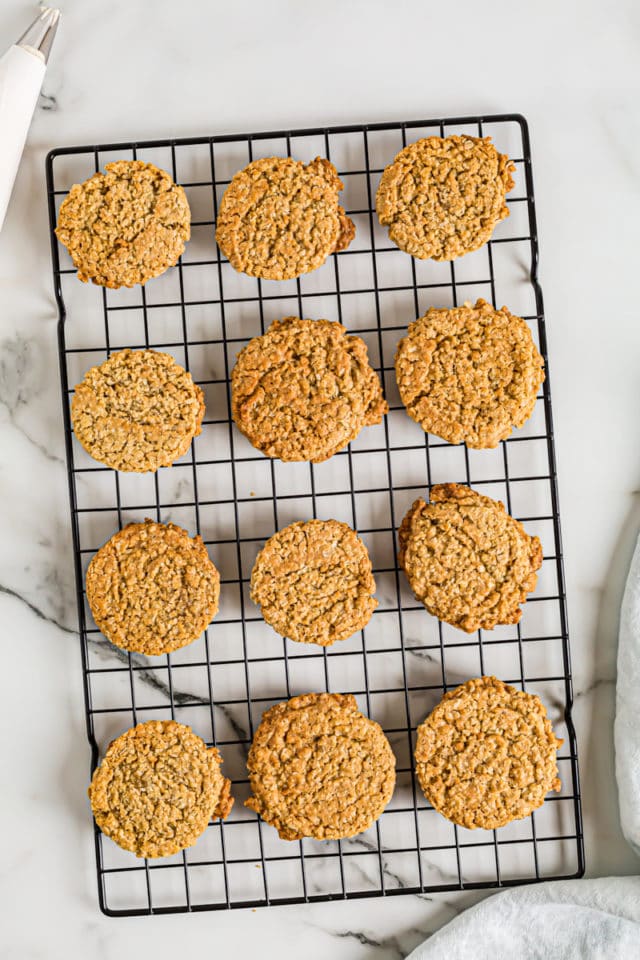 Overhead view of oatmeal cookies on wire rack