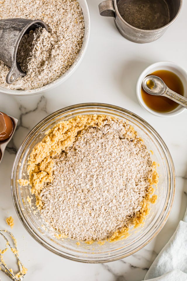 Overhead view of wet and dry ingredients in mixing bowl