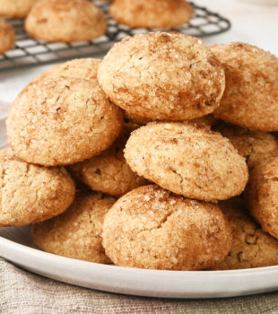 pile of Brown Butter Cinnamon Cookies on a light gray plate