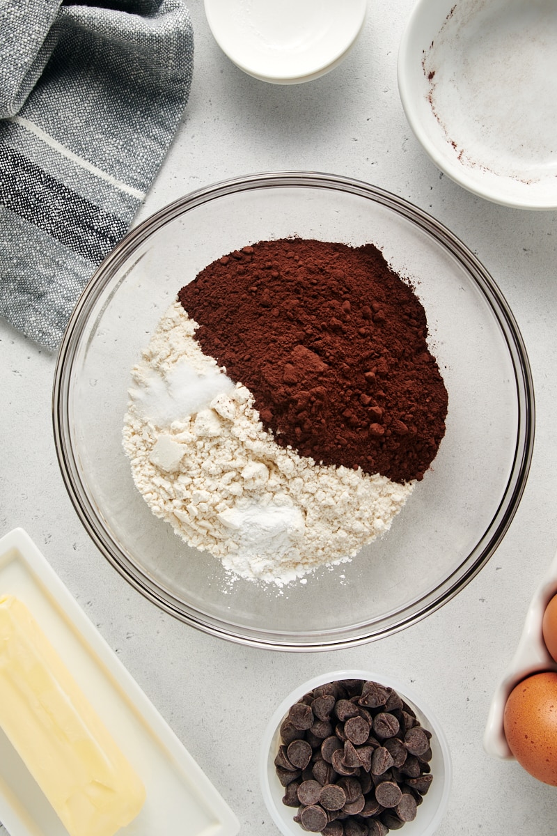 overhead view of dry ingredients for Chocolate Loaf Cake in a glass mixing bowl