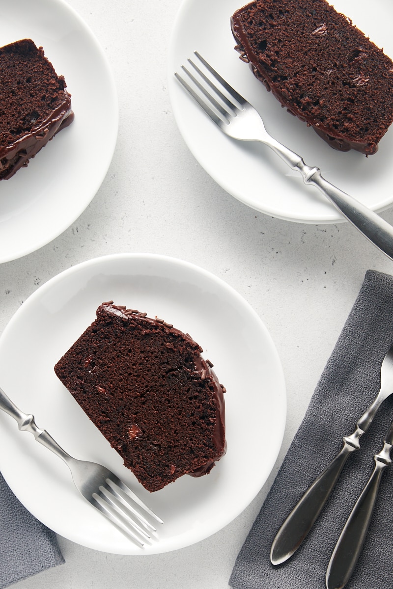 overhead view of slices of Chocolate Loaf Cake on white plates