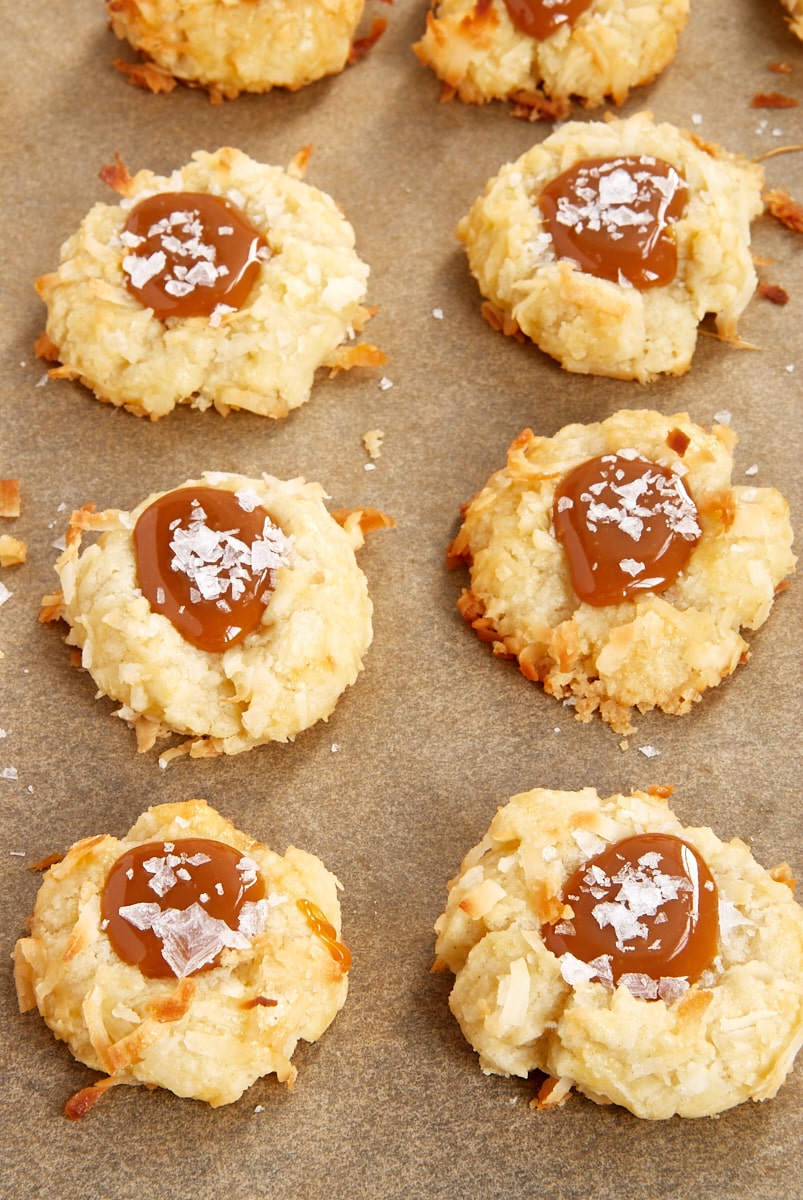 overhead view of Coconut-Salted Caramel Thumbprint Cookies on parchment paper