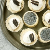 overhead view of Cookies and Cream Cheesecakes on a pewter tray