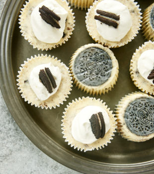 overhead view of Cookies and Cream Cheesecakes on a pewter tray