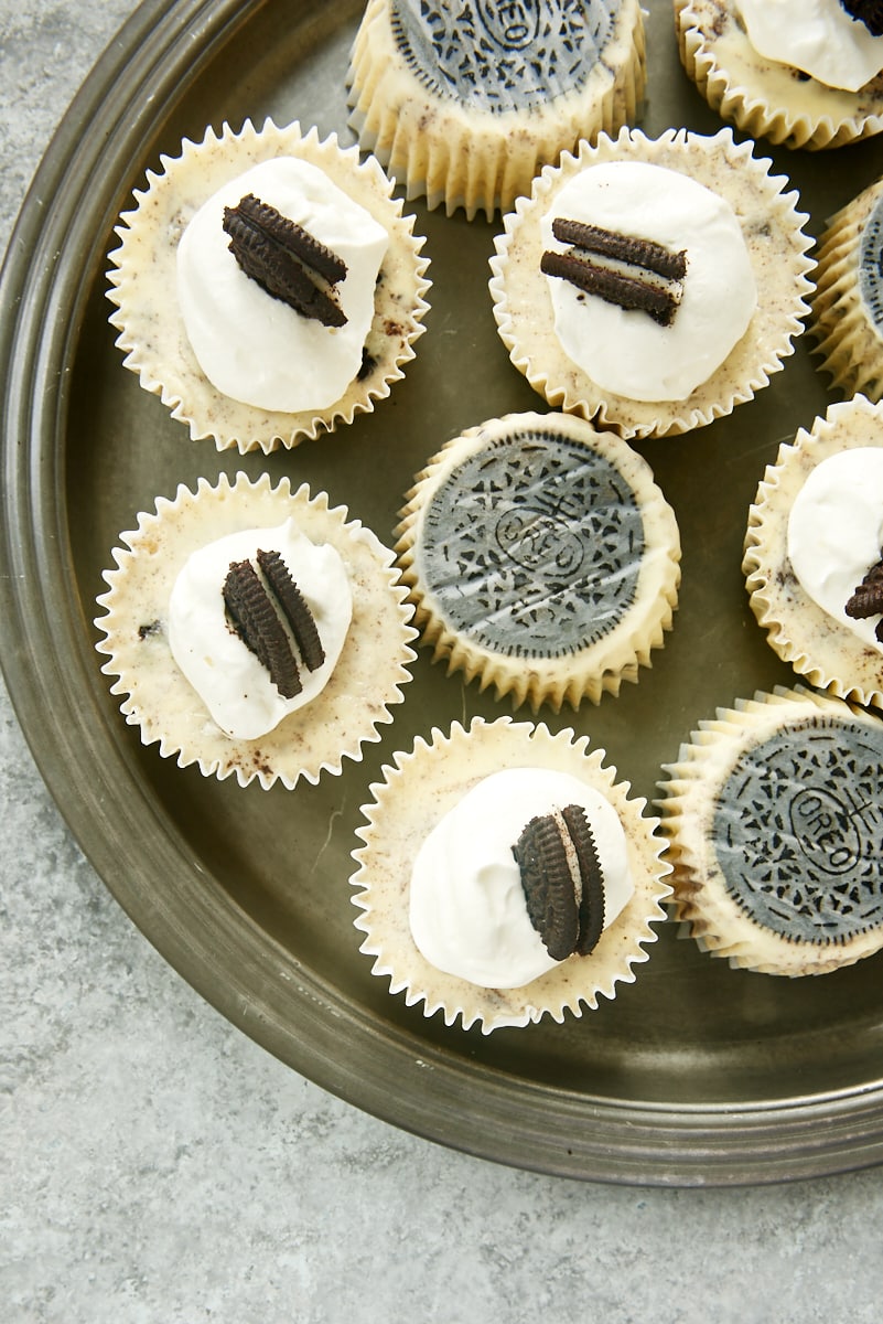 overhead view of Cookies and Cream Cheesecakes on a pewter tray