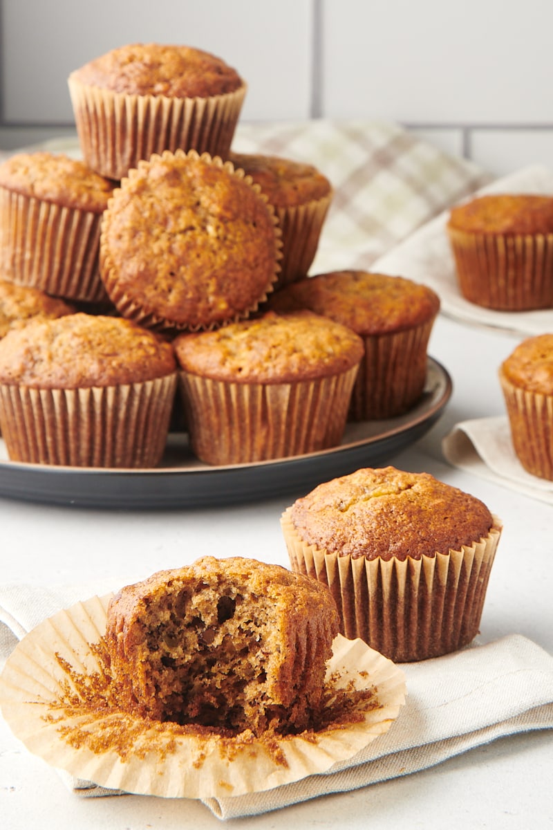 a partial Banana Nut Muffin surrounded by more muffins