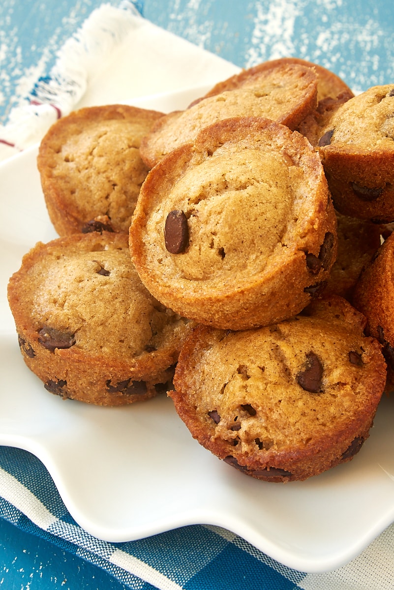 Chocolate Chip Muffins piled on a white plate