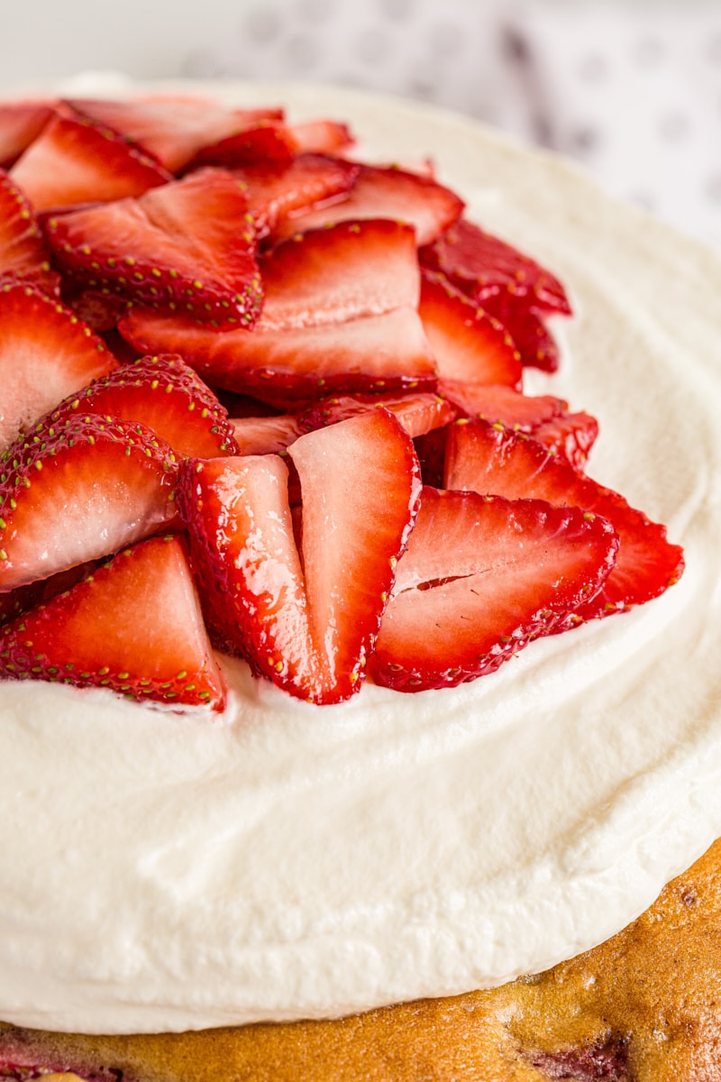 Lemon-Strawberry Shortcake closeup, showing whipped cream and strawberry topping