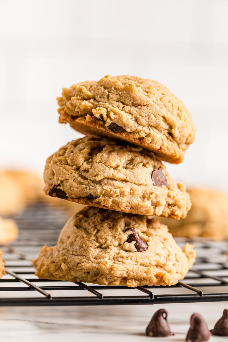 Stack of Oatmeal Peanut Butter Chocolate Chip Cookies on wire cooling rack