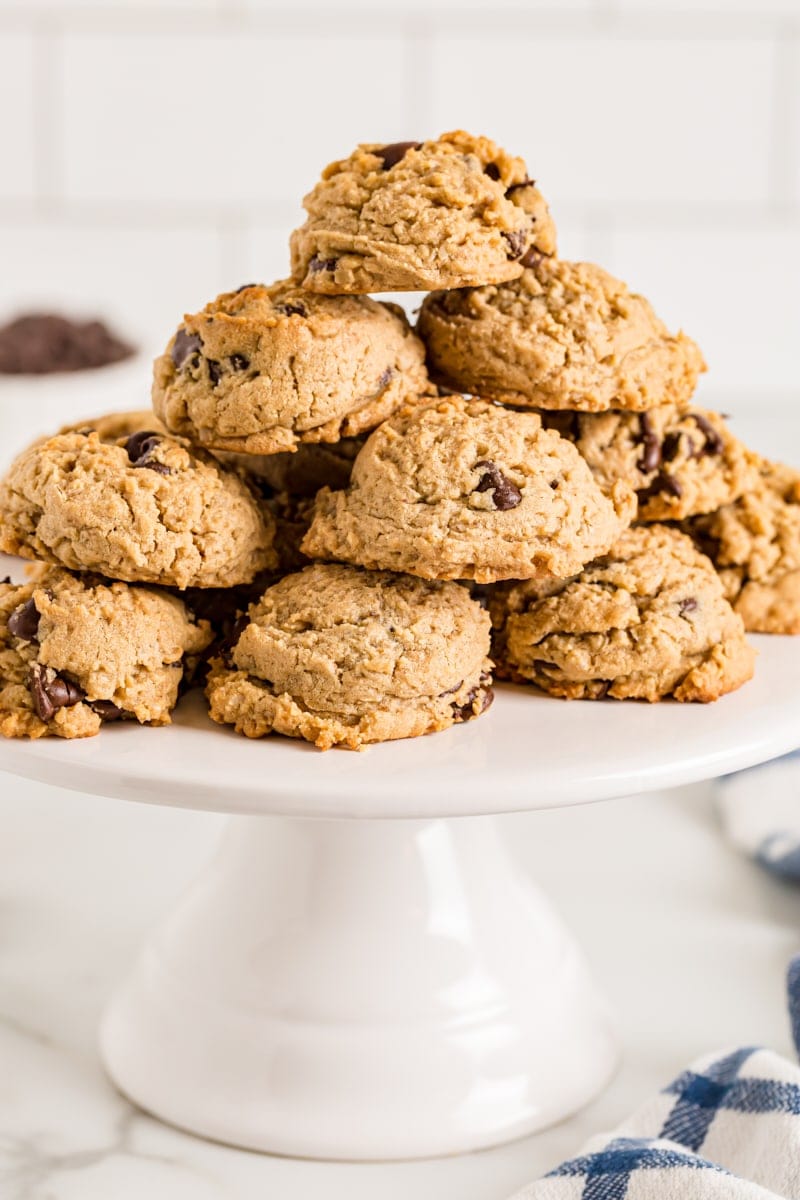 Oatmeal Peanut Butter Chocolate Chip Cookies stacked on cake stand