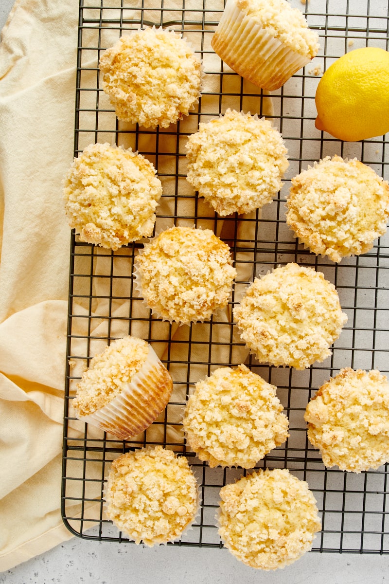 overhead view of Lemon Crumb Muffins on a wire cooling rack