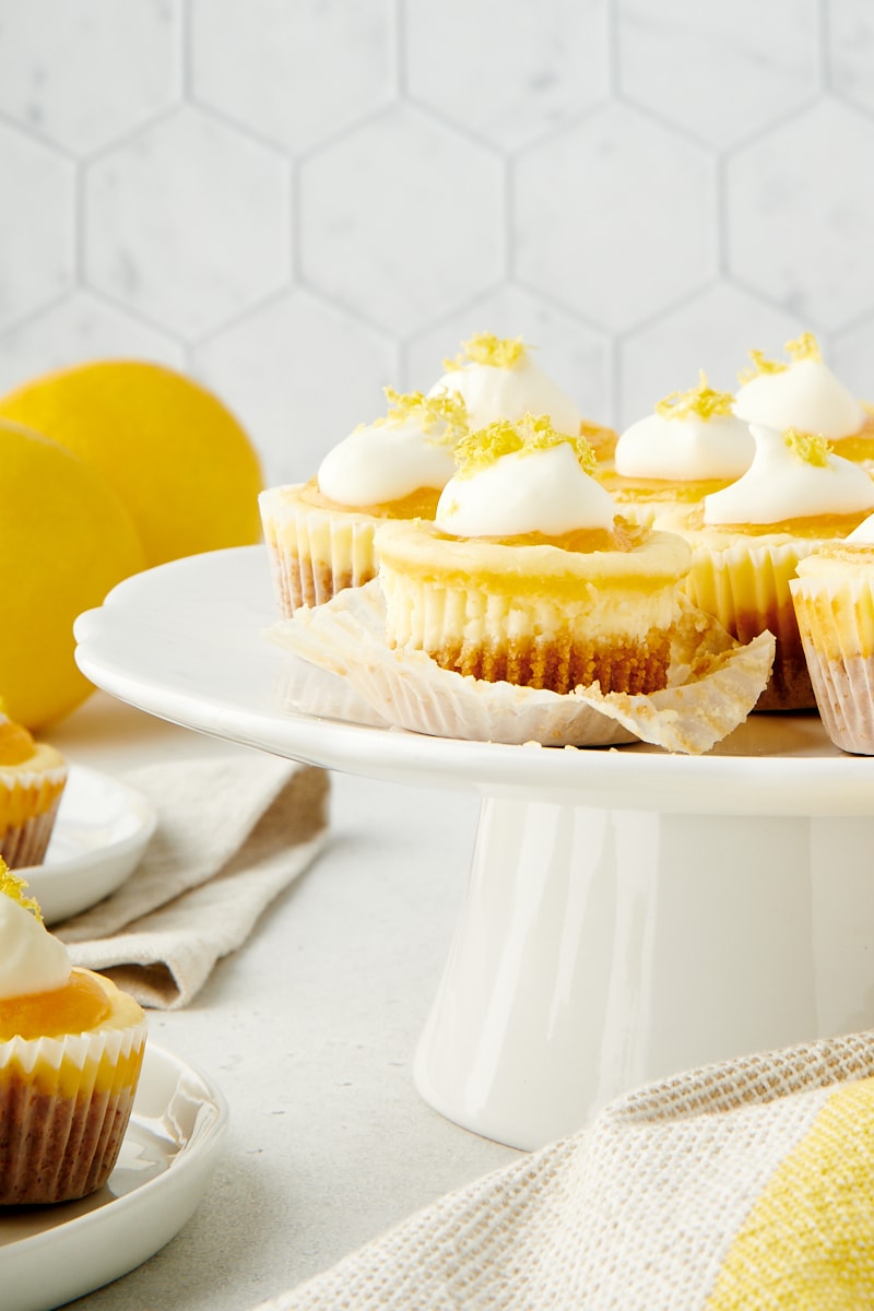 Mini Lemon Cheesecakes on a small white cake stand