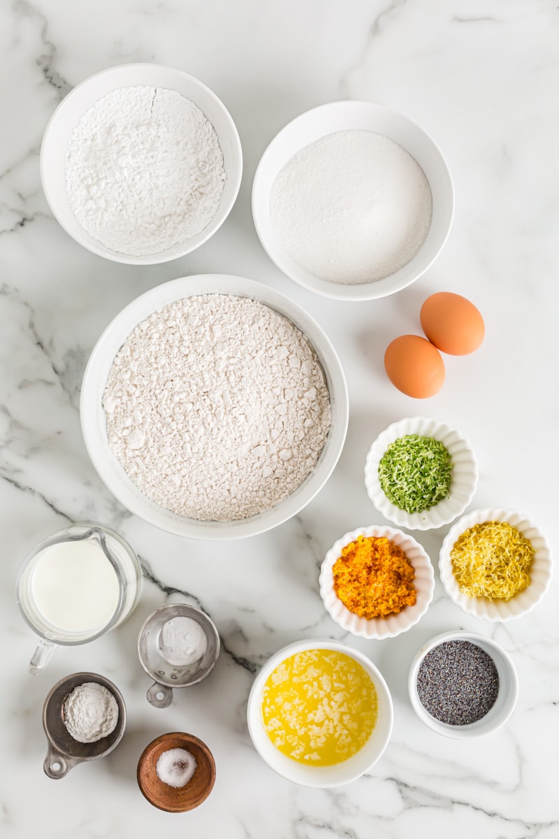 Overhead view of ingredients for triple citrus poppy seed muffins