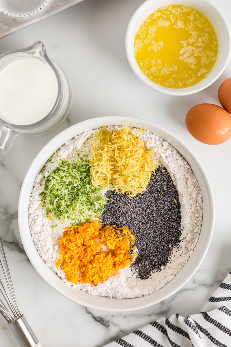 Overhead view of dry muffin ingredients in bowl before mixing