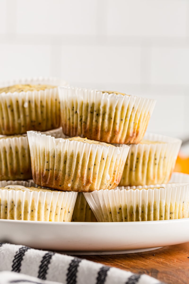 Stack of triple citrus poppy seed muffins