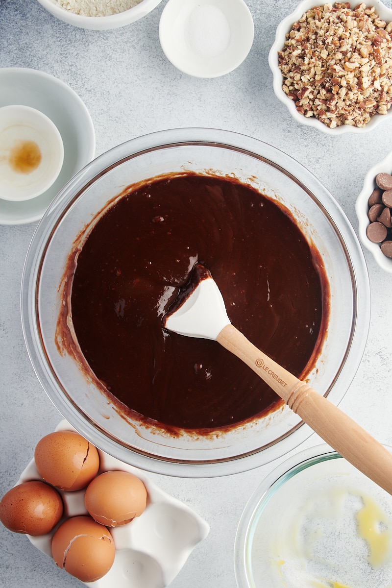 Overhead view of wet ingredients for brownies in mixing bowl