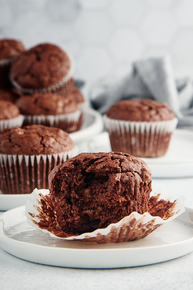 Brownie cupcake on plate with wrapper removed