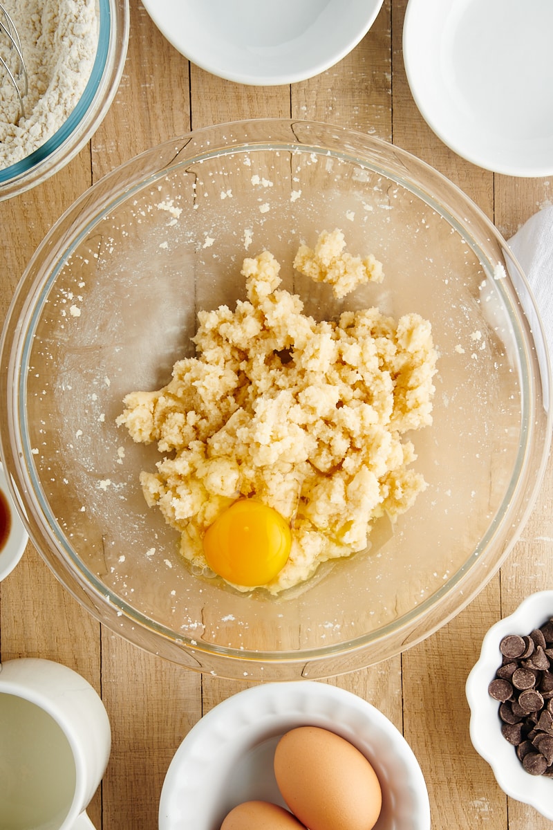 overhead view of partially mixed wet ingredients for Chocolate Chip Loaf Cake