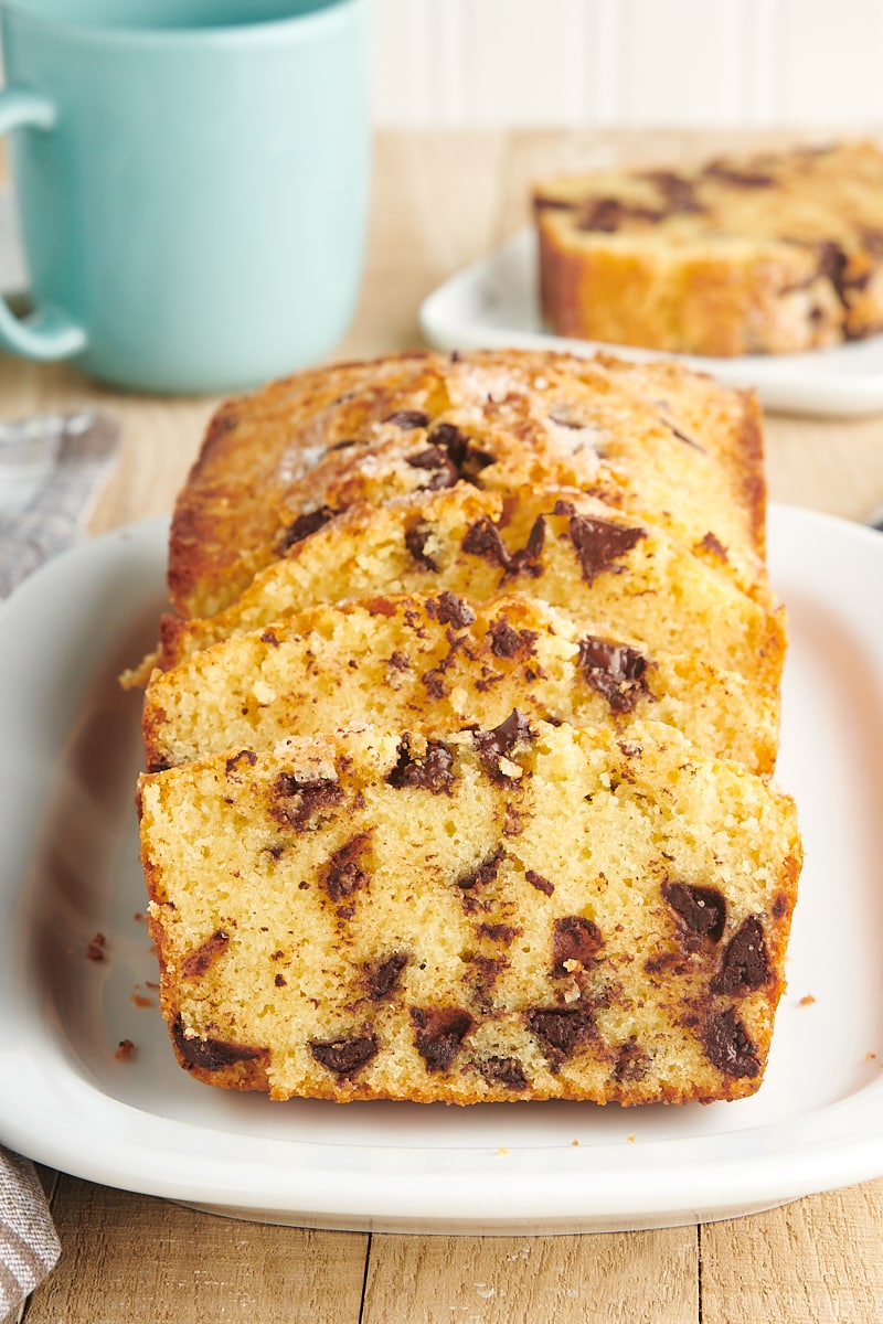 sliced Chocolate Chip Loaf Cake on a white serving tray