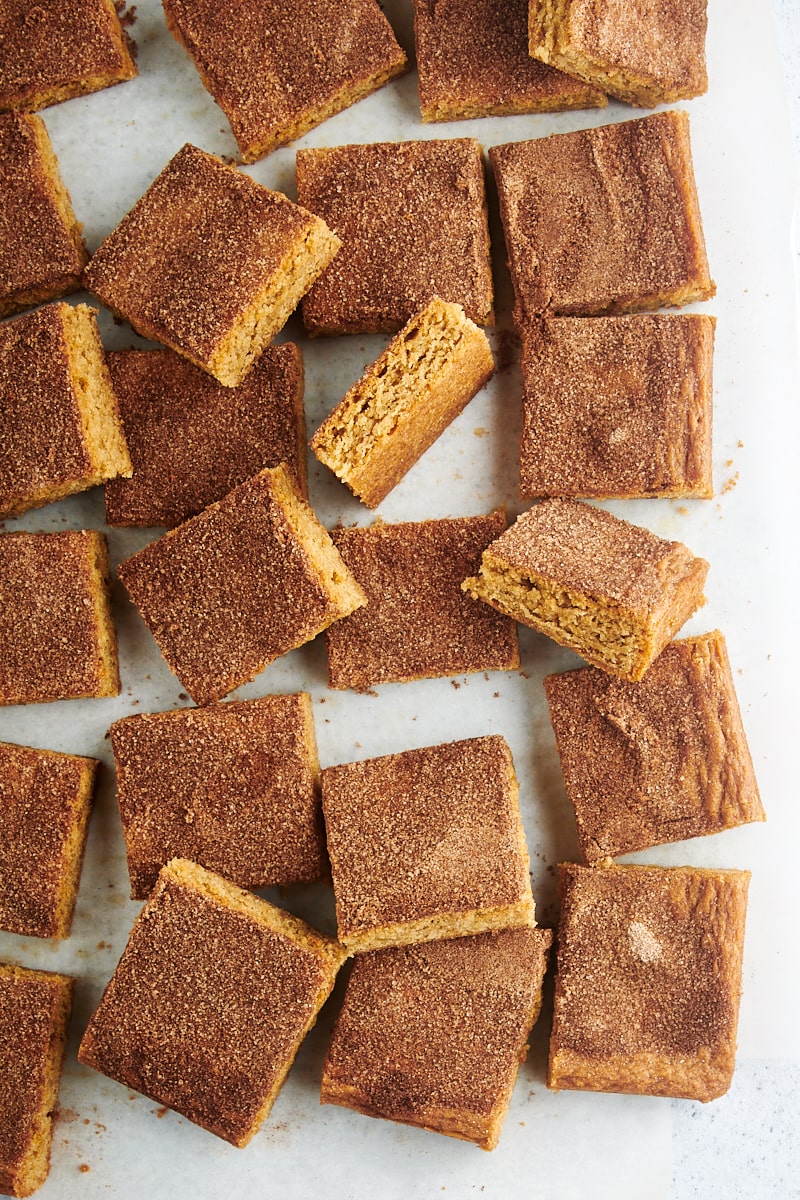 Overhead view of snickerdoodle bars on white board