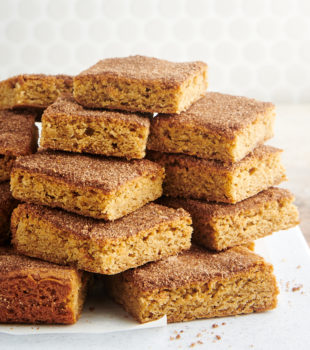 Stacks of snickerdoodle bars on white board