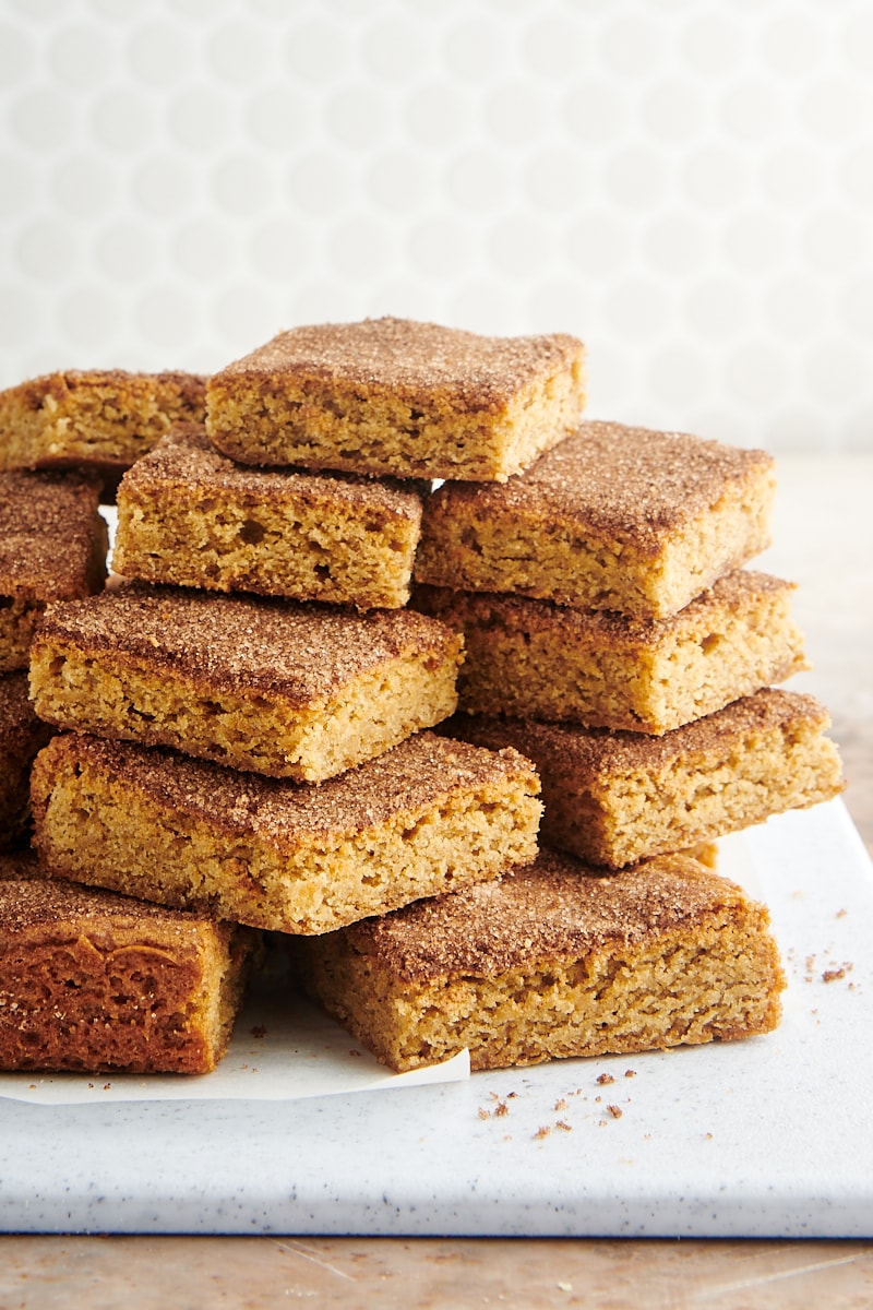 Stacks of snickerdoodle bars on white board