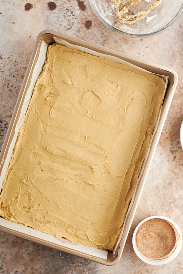 Snickerdoodle bar dough in baking pan