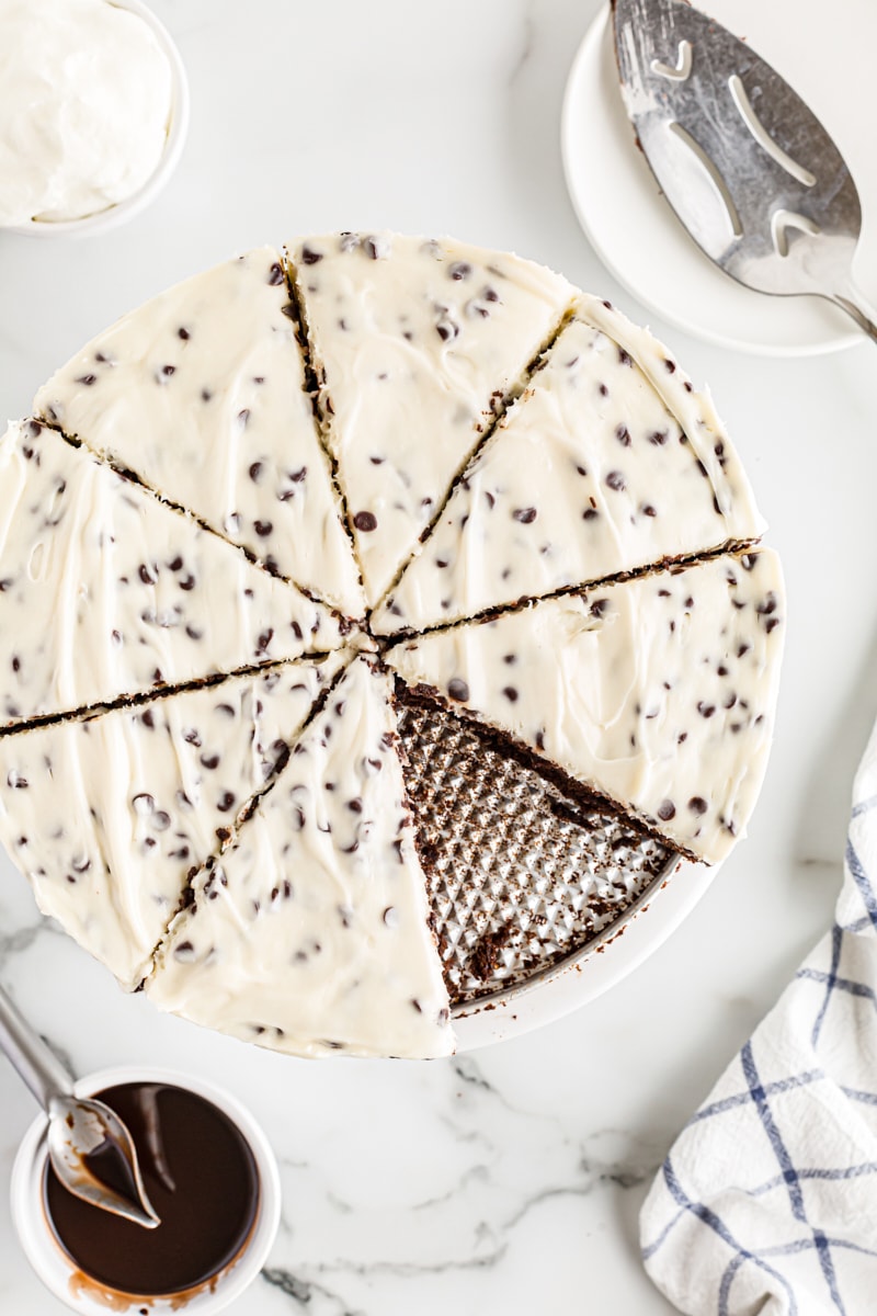 Overhead view of whole sliced Chocolate Chip Cheesecake