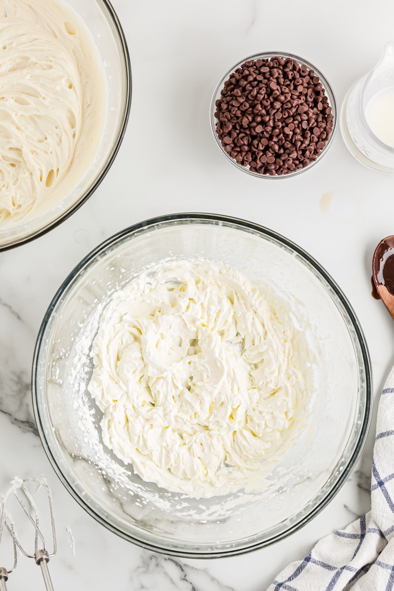 Overhead view of whipped cream in mixing bowl