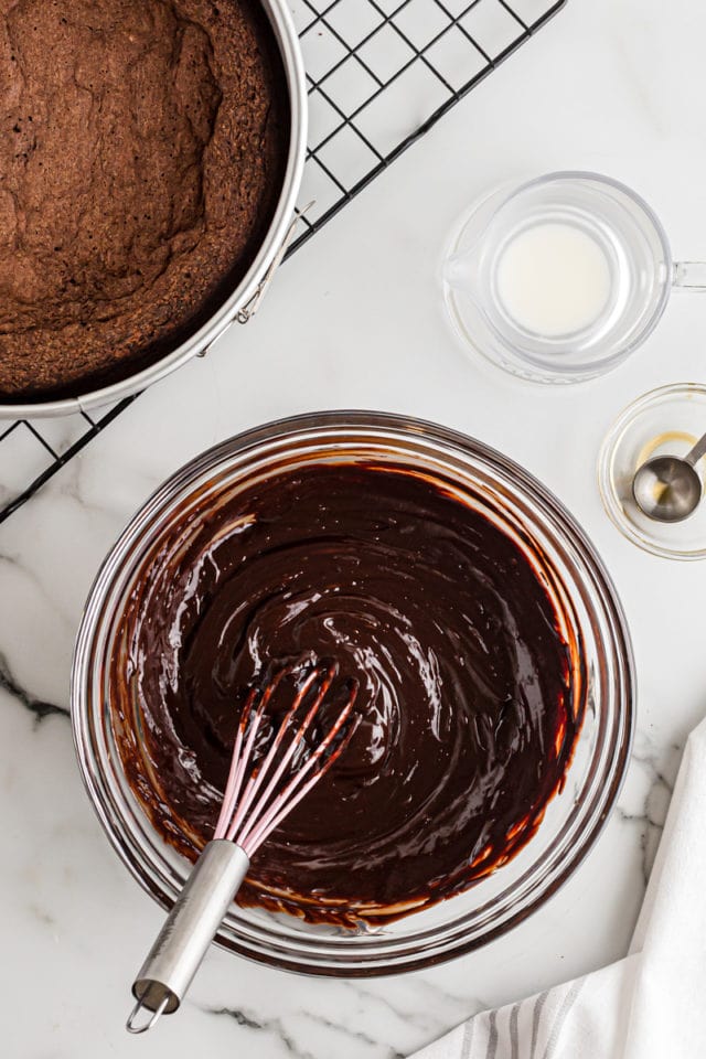 Whisking ganache in glass bowl