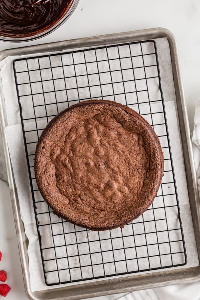 Flourless chocolate cake on wire rack