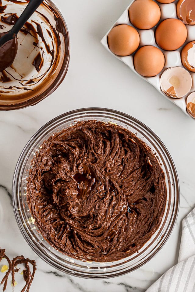 Overhead view of chocolate cake batter in mixing bowl