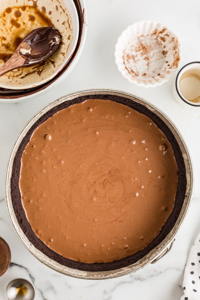 Overhead view of flourless cake batter in pan