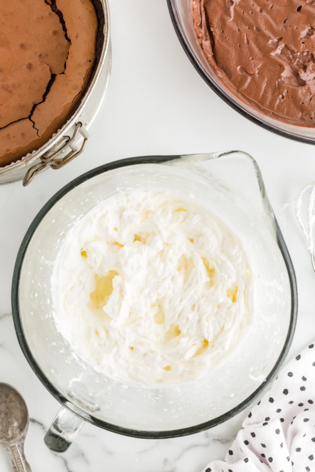 Overhead view of whipped cream in mixing bowl