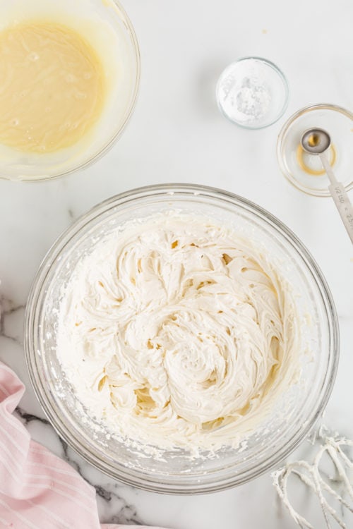 White chocolate frosting in mixing bowl