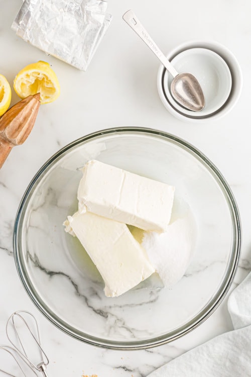 Overhead view of cream cheese filling ingredients in bowl