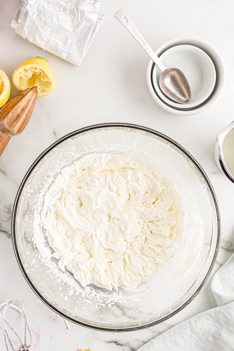 Overhead view of whipped cream in mixing bowl