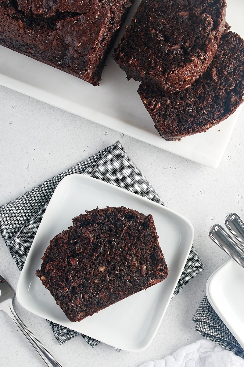 slice of Chocolate Zucchini Bread on a white plate