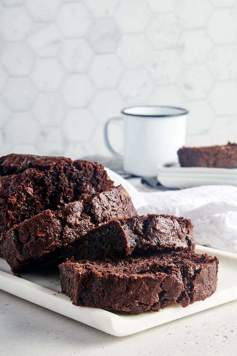 slices of Chocolate Zucchini Bread on a white tray