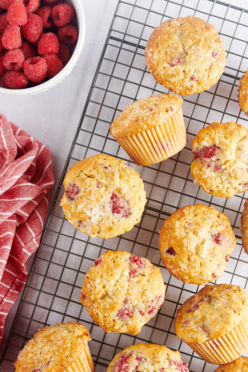 Raspberry oat muffins on wire rack